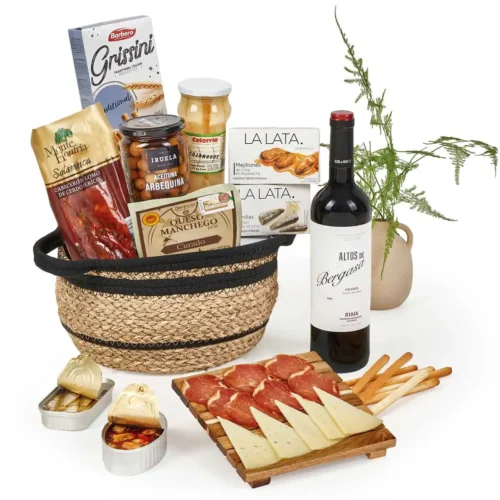 “Cesta de Navidad gourmet en cesto artesanal con vino, embutidos, queso y conservas premium – Cucadas Mara Valencia”